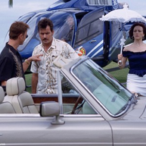 GARY SINISE, CHARLIE SHEEN and BEBE NEUWIRTH in Shangri-La Entertainment's "The Big Bounce," starring Owen Wilson and Morgan Freeman, distributed by Warner Bros. Pictures.