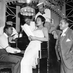 ST. LOUIS BLUES, from left, front, Nat King Cole, Eartha Kitt, Cab Calloway, 1958