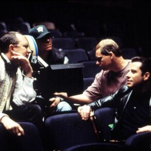 GET SHORTY, John Travolta, discussing a scene with director, Barry Sonnenfeld, 1995.