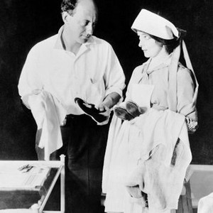 THE HEART OF NORA FLYNN, from left: director Cecil B. DeMille, Marie Doro on set, 1916