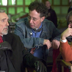 On the set are (left to right) DENNIS HOPPER as Kaufman and producers MARK CANTON and PETER GRUNWALD.