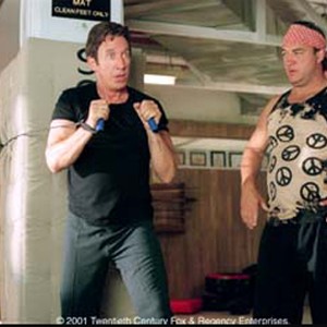 Joe Scheffer (TIM ALLEN, left) undergoes vigorous training under the watchful eye of karate instructor Chuck Scarett (JIM BELUSHI).