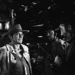ONCE UPON A TIME IN THE WEST, from left: Lionel Stander (far left, background), Charles Bronson (harmonica), Jason Robards (far right), 1968 ouatitw1968-fsct08(ouatitw1968-fsct08)