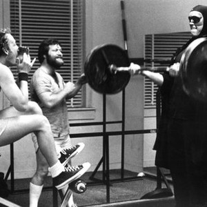 STAY HUNGRY, Robert Englund (left), Arnold Schwarzenegger, 1976