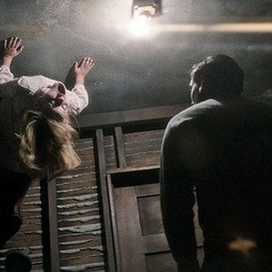 (L-R) Lulu Wilson as Doris Zander and Henry Thomas as Father Tom in "Ouija: Origin of Evil." photo 9