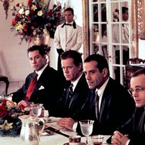 Attorney Jan Schlichtmann (John Travolta, left) consults with his partners, (left to right) James Gordon (William H. Macy), Kevin Conway (Tony Shalhoub), and Bill Crowley (Zeljko Ivanek). photo 16