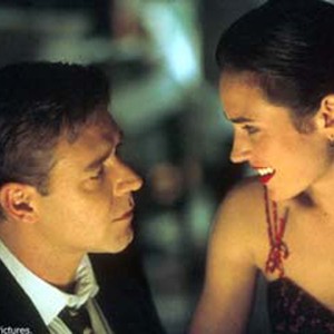 Mathematical genius John Forbes Nash, Jr. (RUSSELL CROWE) learns about love from MIT physics student Alicia Larde (JENNIFER CONNELLY). photo 13