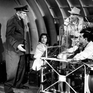 THE GIANT CLAW, from left, Morris Ankrum, Mara Corday, Edgar Barrier, Jeff Morrow, 1957