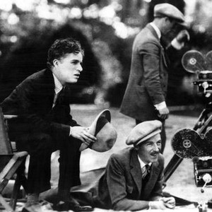 A WOMAN OF PARIS, director Charles Chaplin, cinematographer Rollie Totheroh on set, 1923