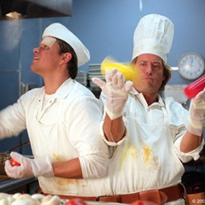 Bob and Walt Tenor (Matt Damon, Greg Kinnear) work some fast food magic at their Quikee Burger diner. photo 11