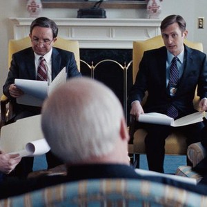 VICE, CHRISTIAN BALE AS DICK CHENEY (BACK TURNED), OTHERS, L-R: JUSTIN KIRK AS SCOOTER LIBBY, EDDIE MARSAN AS PAUL WOLFOWITZ, BRANDON BALES AS CIA AGENT NUMBER 1, DON MCMANUS AS DAVID ADDINGTON, 2018. © ANNAPURNA PICTURES