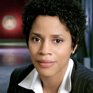 Judith Scott as Dep. Dir. Louise Beckett