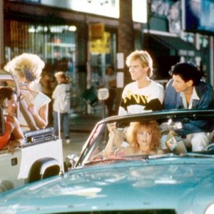 EARTH GIRLS ARE EASY, Julie Brown (front, right of center), Geena Davis (front right), Jim Carrey (center, back row), Jeff Goldblum (back, second from right), Damon Wayans back right), 1989. ©Vestron Pictures