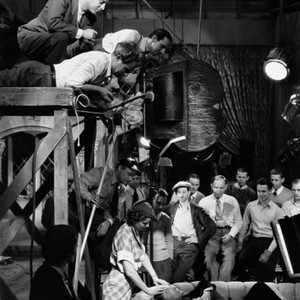 WHERE SINNERS MEET, director J. Walter ruben (in jacket top) filming Diana Wynyard, Clive Brook (on couch) on set, 1934