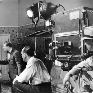PASSPORT HUSBAND, from left: Pauline Moore, Stuart Erwin, director James Tinling, assistant cameraman Kenneth Green, rehearsing scene, 1938. ©20th Century-Fox Film Corporation, TM & Copyright