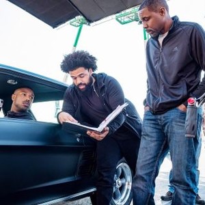 CREED II, (FROM LEFT): MICHAEL B. JORDAN (IN CAR), DIRECTOR STEVE CAPLE JR., WOOD HARRIS, ON SET, 2018. PH: BARRY WETCHER/© MGM