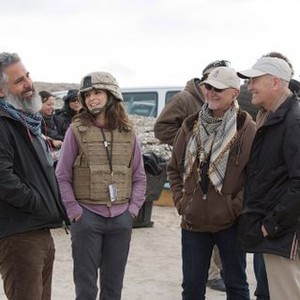 WHISKEY TANGO FOXTROT, foreground from left: director Glenn Ficarra, Tina Fey, producer Ian Bryce, Defense Director of Entertainment Media Phil Strub, on set, 2016. ph: Frank Masi/© Paramount Pictures