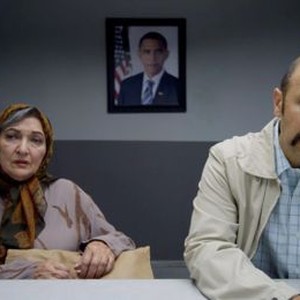 JIMMY VESTVOOD: AMERIKAN HERO, from left: Vida Ghahremani, Maz Jobrani, on wall: President Barack Obama, 2016