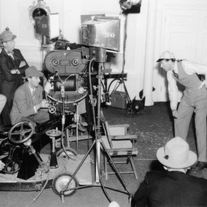 MEET JOHN DOE, director Frank Capra, (far left), Gary Cooper, (right), on-set, 1941