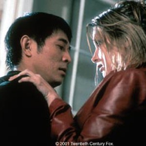 Top Chinese agent Liu Jiuan (JET LI) unexpectedly finds himself coming to the aid of a prostitute (BRIDGET FONDA) in KISS OF THE DRAGON. photo 1