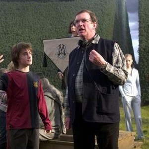 HARRY POTTER AND THE GOBLET OF FIRE, Daniel Radcliffe, director Mike Newell on set, 2005, (c) Warner Brothers