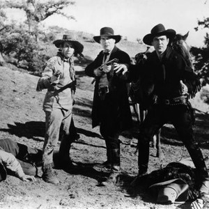 RUSTLERS OF RED DOG, standing from left: Raymond Hatton, Walter Miller, Johnny Mack Brown, 1935