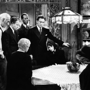 BIG CITY, standing from left: Clem Bevans, Regis Toomey, Irving Bacon (rear), Spencer Tracy, seated: Janet Beecher (back to camera left), Luise Rainer (facing front), 1937
