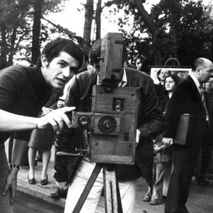 AND NOW MY LOVE, (aka TOUTE UNE VIE), director Claude Lelouch (left) on set, 1974