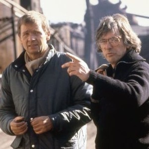 ROBOCOP, cinematographer Jost Vacano, director Paul Verhoeven, on set, 1987. (c)Orion Pictures