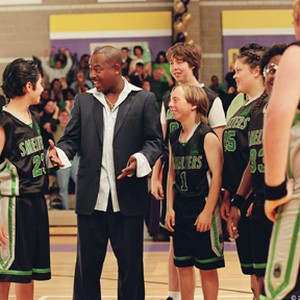 Martin Lawrence stars as a high-strung, high-powered college basketball coach who finds himself leading a junior high school team comprised of athletically-challenged youngsters, in REBOUND. photo 18