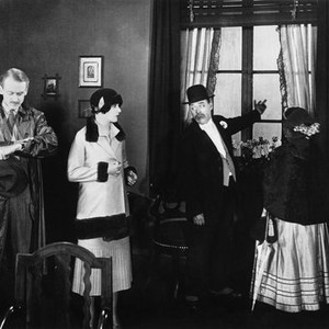 THE PLEASURE GARDEN, Miles Mander (left), Virginia Valli (center), 1925
