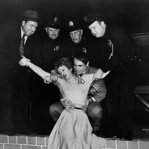 WITNESS TO MURDER, Jesse White (left), Barbara Stanwyck (front center), Gary Merrill (center, second row), Harry Shannon (center, back), 1954
