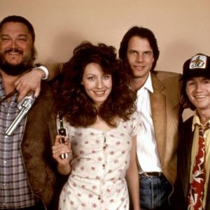 PASS THE AMMO, Dennis Burkley (far left), Linda Kozlowski (second from left), Bill Paxton (third from left), 1988. ©New Century Vista Film