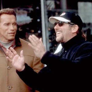 JINGLE ALL THE WAY, Arnold Schwarzenegger, director Brian Levant, on set, 1996. TM and Copyright ©20th Century Fox Film Corp. All rights reserved.