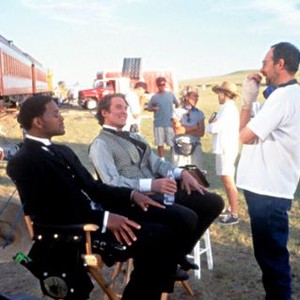 WILD WILD WEST, Director, Barry Sonnenfeld, discusses a scene, with Kevin Kline and Will Smith, on location, 1999.