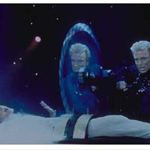 Siegfried appears to slice Roy in half while performing in their Las Vegas stage show in "Siegfried & Roy: The Magic Box", an L-Squared Entertainment Production and an IMAX r 3D Experience. photo 1
