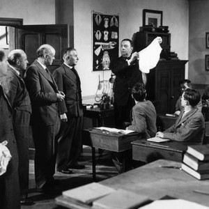 THE HAPPIEST DAYS OF YOUR LIFE, standing: Arthur Howard, Laurence Naismith, Alastair Sim, Stringer Davis, Kenneth Downey, 1950