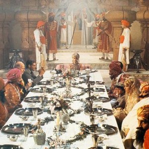 INDIANA JONES AND THE TEMPLE OF DOOM, Maharaja's banquet, Raj Singh (ctr) Harrison Ford (left) 1984