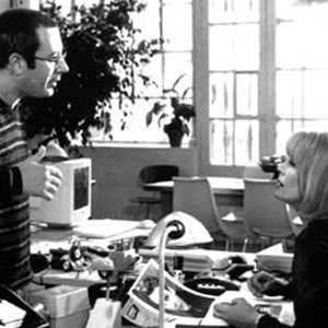 (Left to right) Director Ben Elton discusses a scene with Joanna Lumley on the set of his film MAYBE BABY, a USA Films release. photo 1