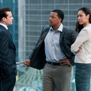 Suits, Gabriel Macht (L), Russell Hornsby (C), Gina Torres (R), 'Dirty Little Secrets', Season 1, Ep. #4, 07/14/2011, ©USA