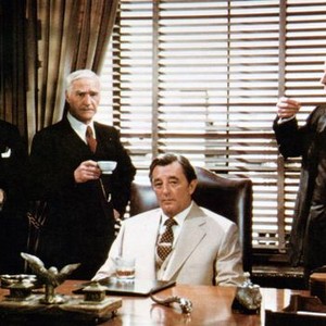 THE LAST TYCOON, from left: Tige Andrews, Byron Morrow, Robert Mitchum, Ray Milland, 1976