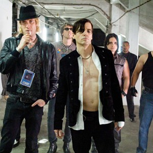 (Front L-R) Rhys Ifans as Roger and Mel Raido as Bryan Metro in "The Informers." photo 4