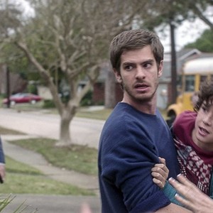 99 HOMES, l-r: Michael Shannon, Andrew Garfield, Noah Lomax, 2014. ©Broad Green Pictures