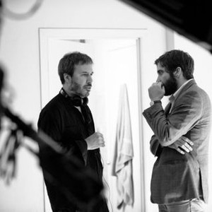ENEMY, from left: director Denis Villeneuve, Jake Gyllenhaal, on set, 2013. ©A24