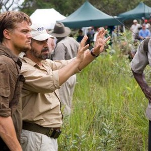 BLOOD DIAMOND, Leonardo DiCaprio, director Edward Zwick, Djimon Hounsou, on set, 2006. ©Warner Bros.
