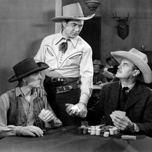 OUTLAWS OF STAMPEDE PASS, from left: Jon Dawson, Johnny Mack Brown, Harry Woods, 1943