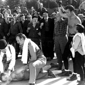 CONFLICT, Ward Bond (on ground), John Wayne (second right), Tommy Bupp (right), 1936