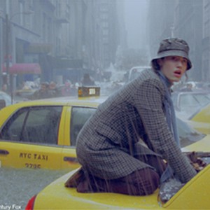 Seconds before Fifth Avenue is buried underwater, Emmy Rossum comes to the aid of a trapped taxi passenger. photo 1