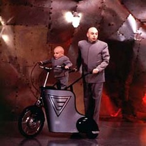 Verne J. Troyer (left) and Mike Myers.