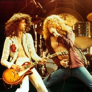 THE SONG REMAINS THE SAME, Led Zeppelin members Jimmy Page and Robert Plant, 1976